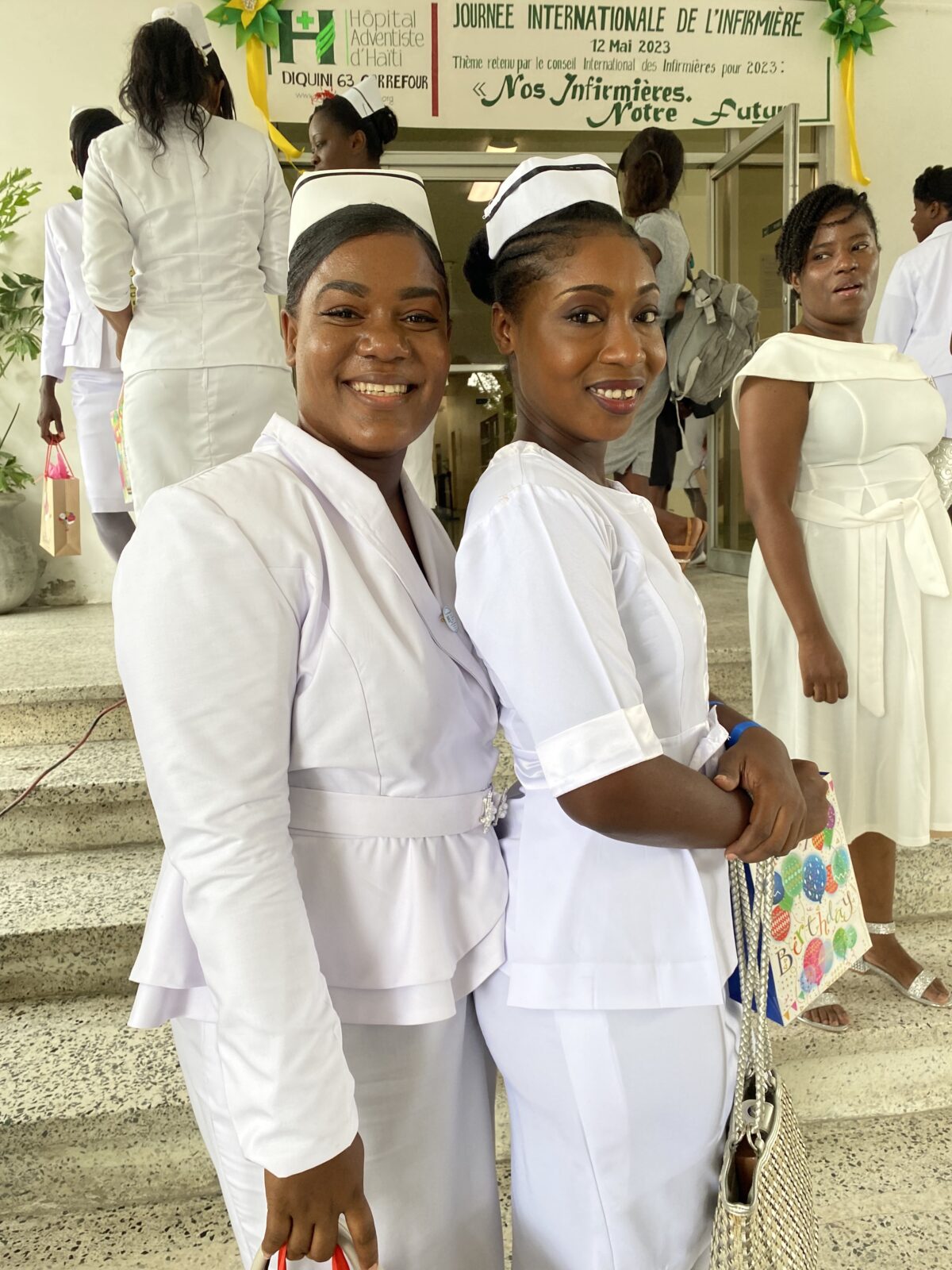 two nurses smiling while celebrating Nurses Day