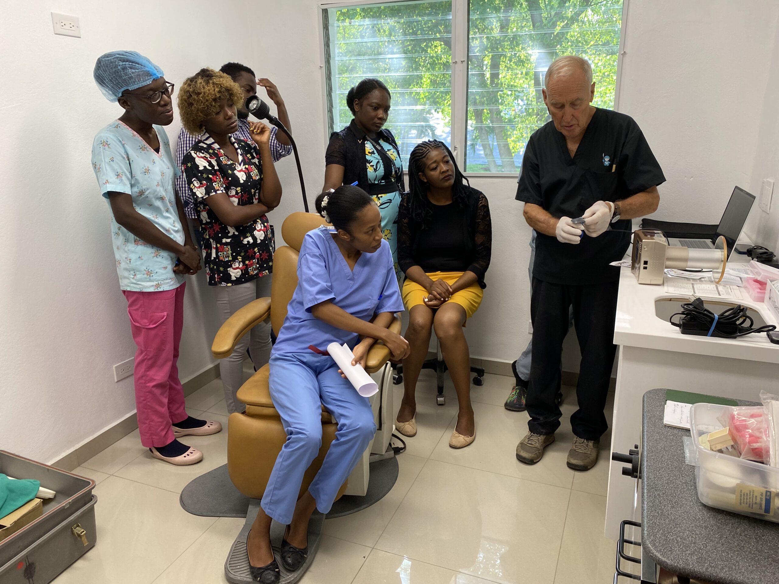 Group of medical students learn how to use an x-ray machine